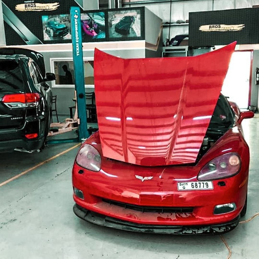 Chevrolet Corvette in the workshop with its bonnet open