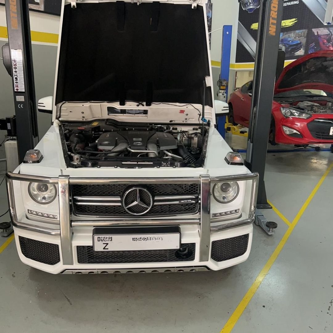 Mercedes-Benz G-Class in the workshop with its bonnet open